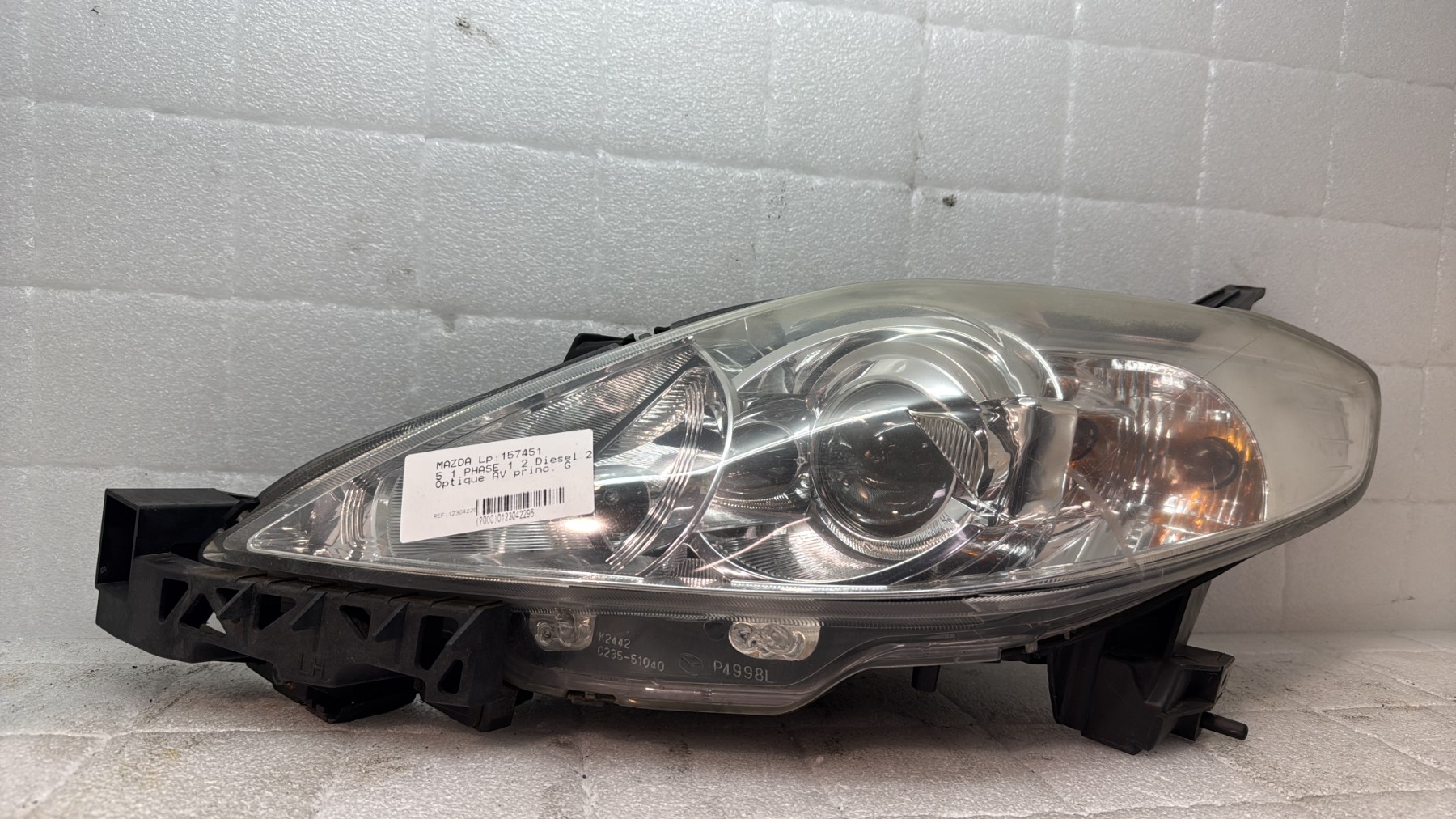 Optique avant principal gauche (feux)(phare) mazda 5 1 phase 1