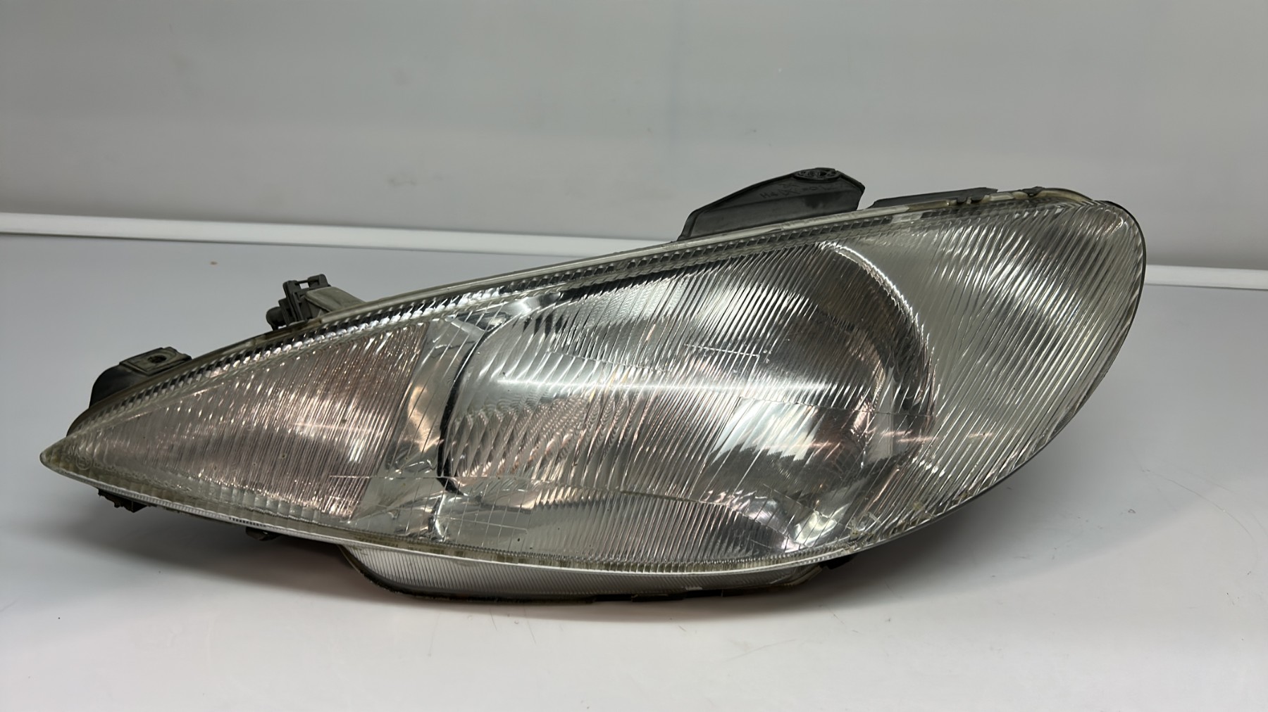 Optique avant principal gauche (feux)(phare) peugeot 206 phase 1