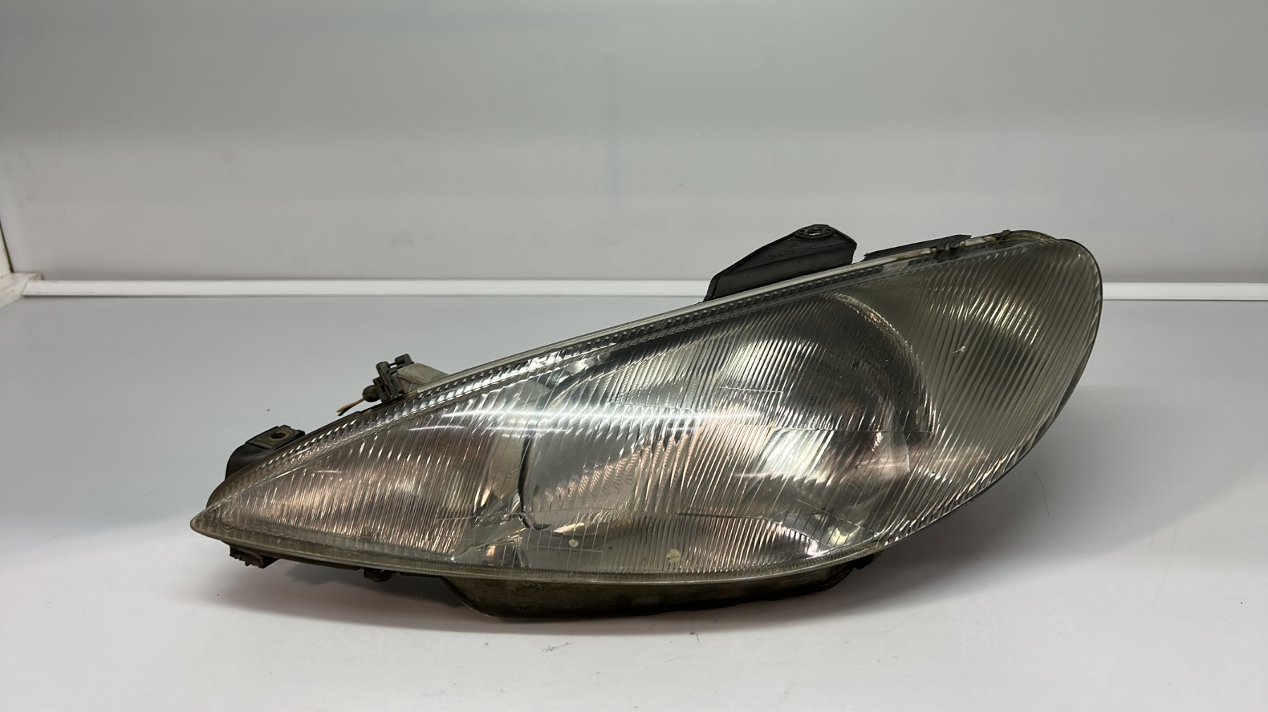 Optique avant principal gauche (feux)(phare) peugeot 206 phase 1