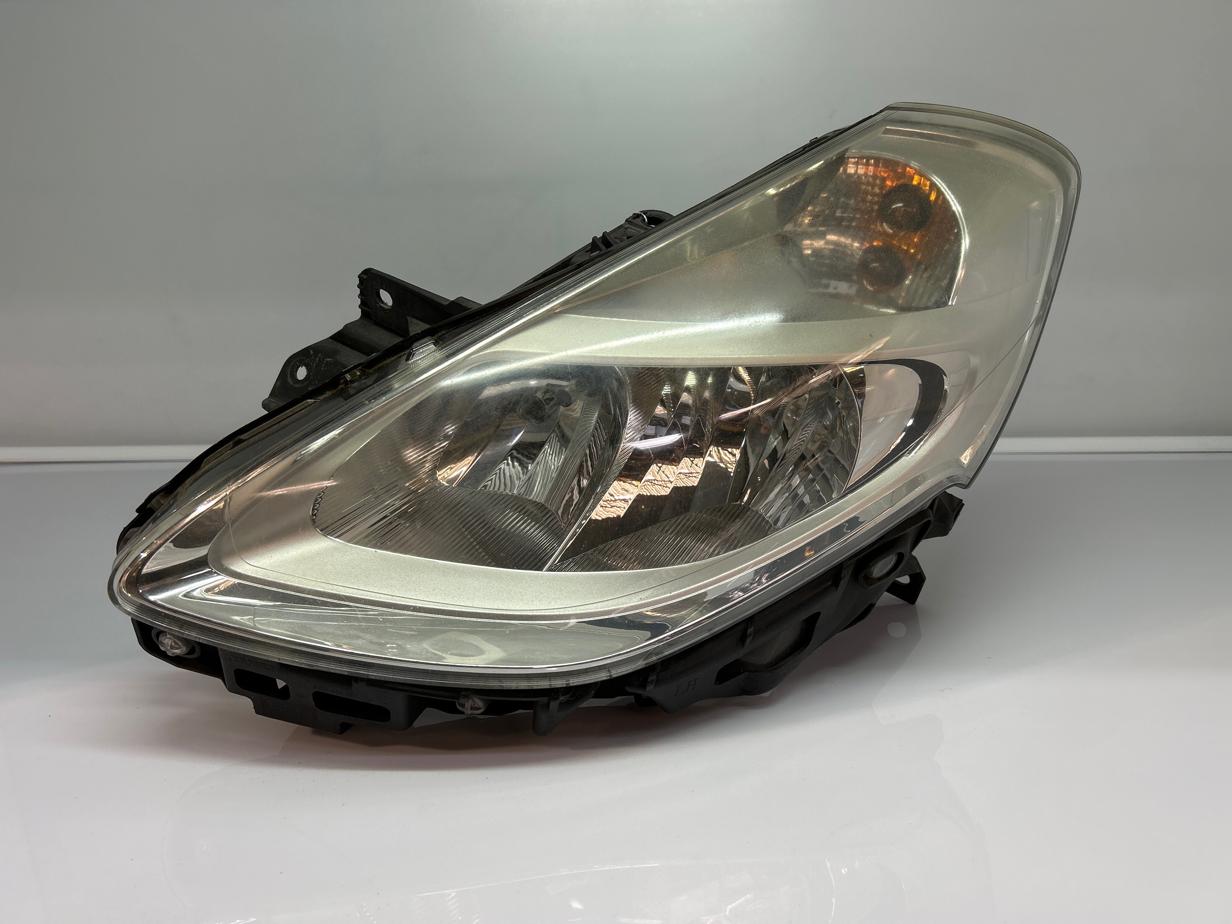 Optique avant principal gauche (feux)(phare) renault clio 3 phase 2